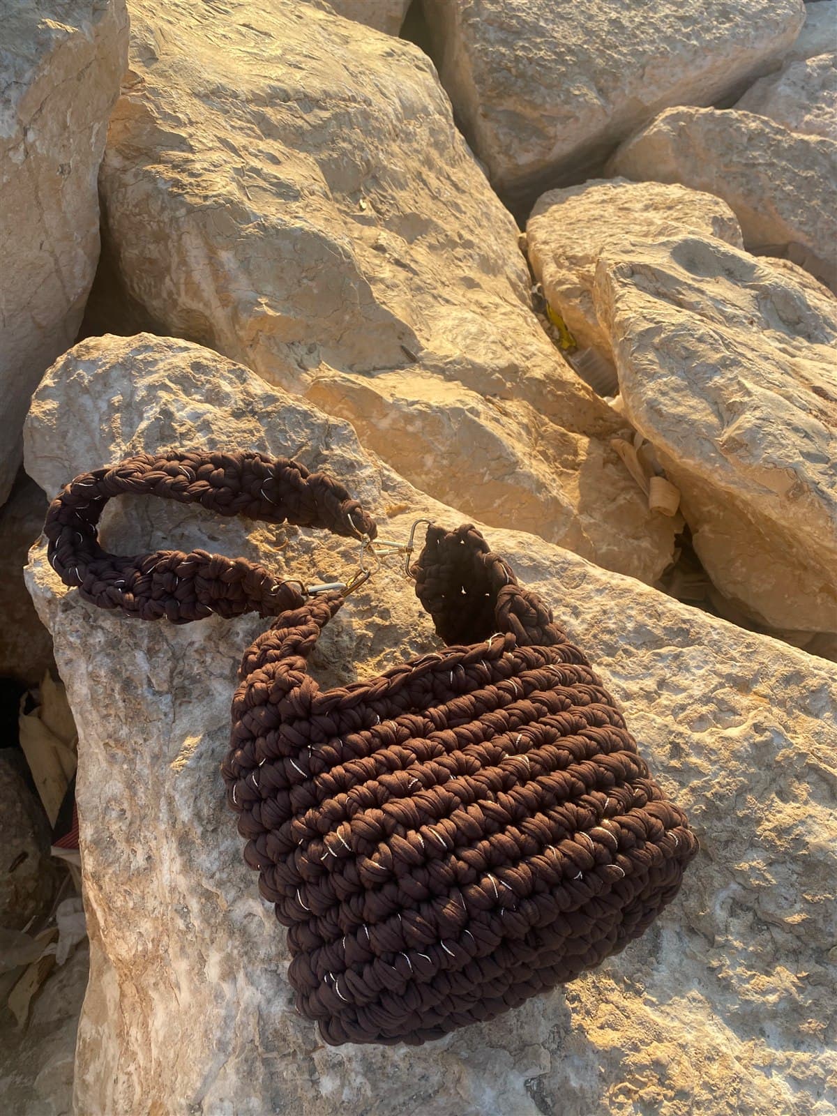 An early handmade brown crochet bag